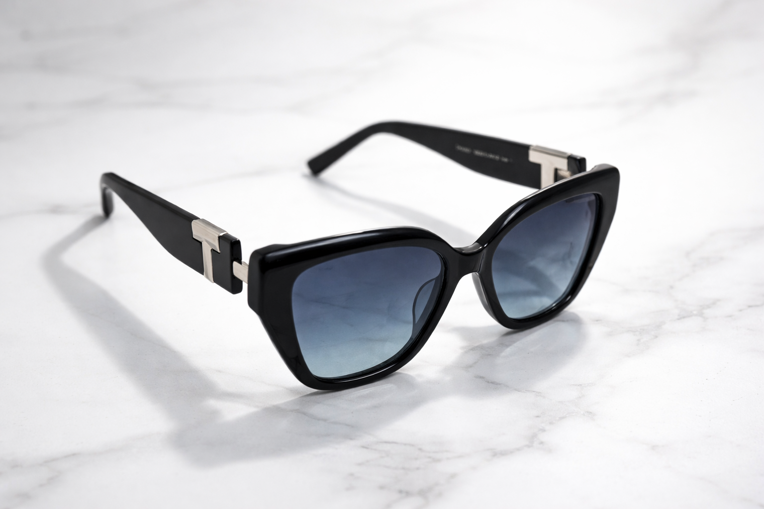 stylish sunglasses frame on a marble surface