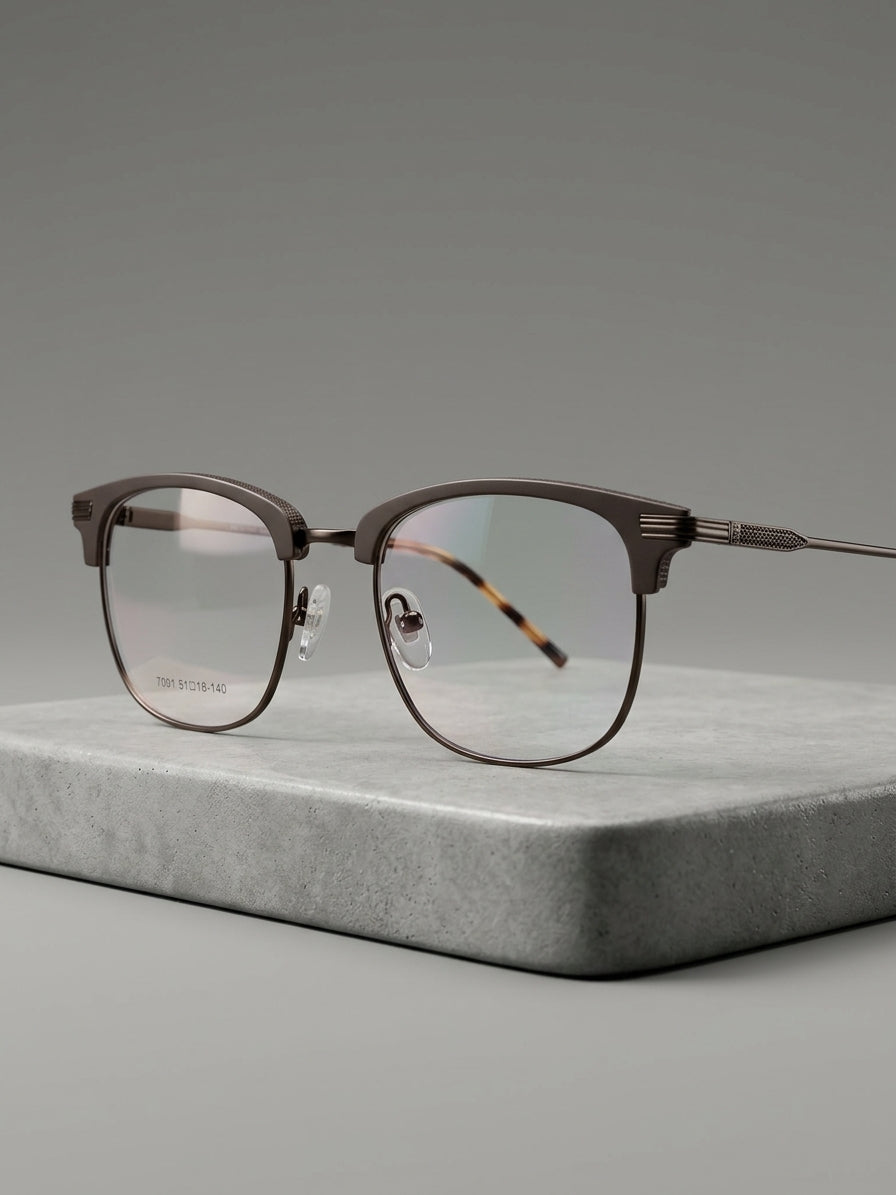 Club Master Frame – gunmetal browline with tortoise temples, 3/4 angle on stone surface