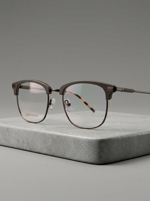 Club Master Frame – gunmetal browline with tortoise temples, 3/4 angle on stone surface