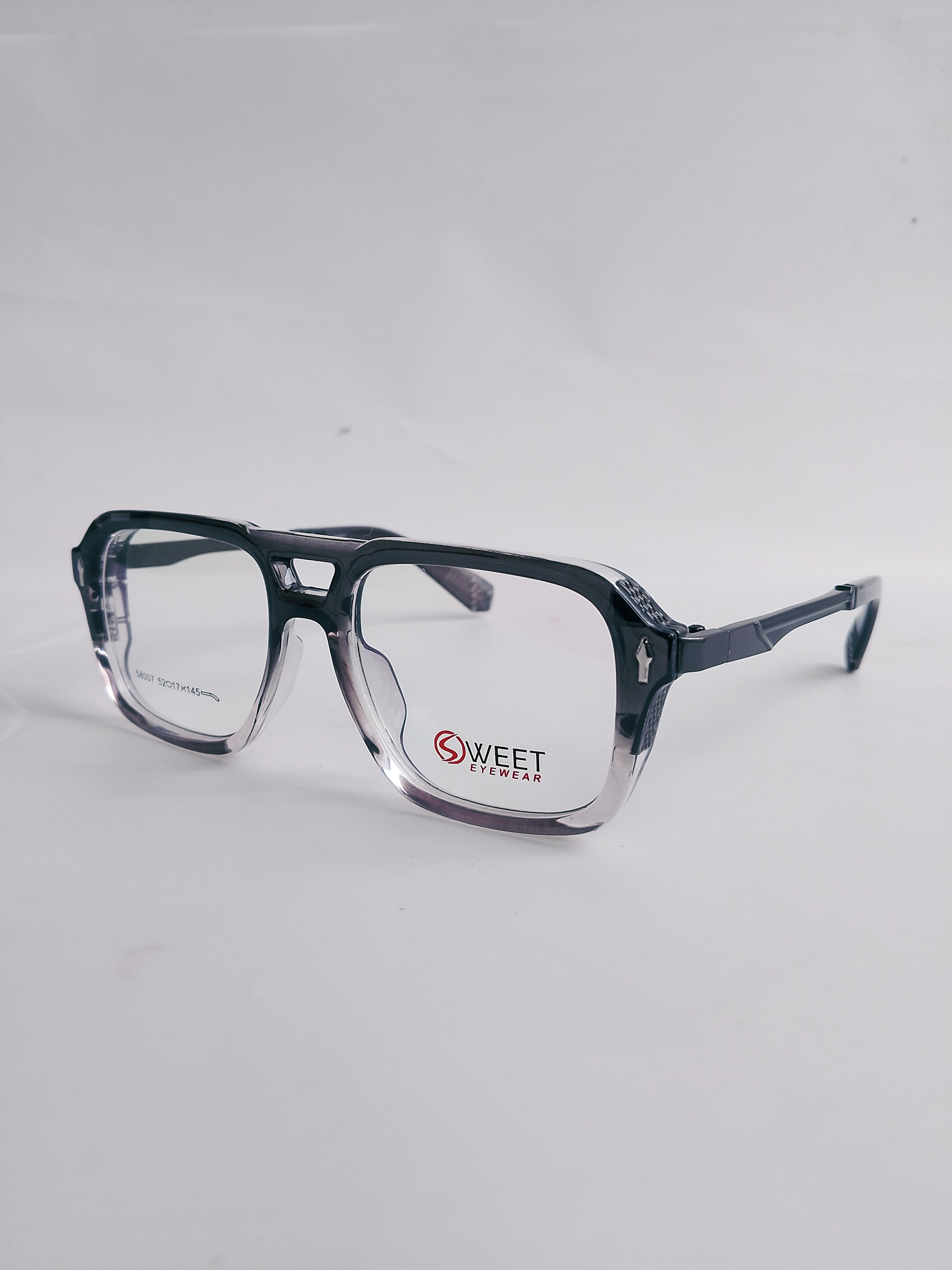 double shade wayfarer with black temple on white surface
