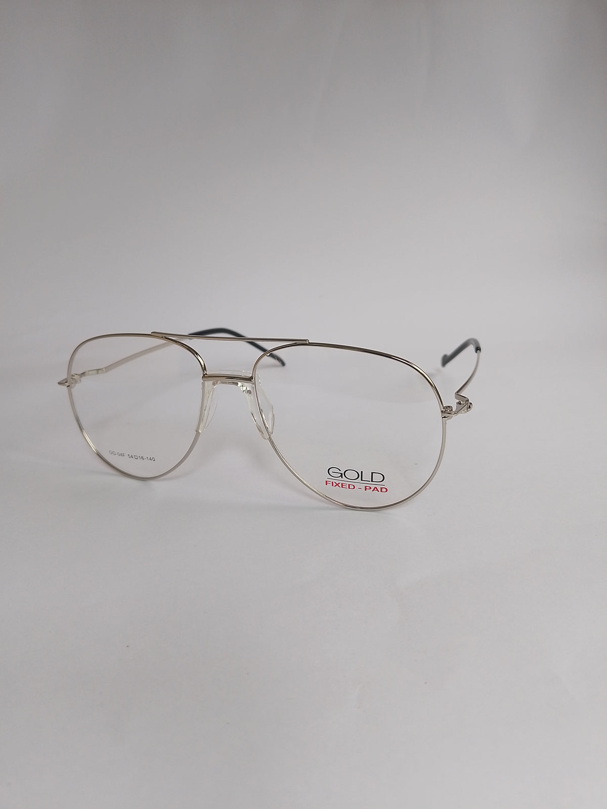 A pair of aviator-style eyeglasses with a thin silver-tone metal frame and dark temples, featuring the brand name 'GOLD' printed on the lower right lens, set against a plain light gray background.