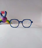 a blue geometric kids frame, front view with a toy in a background.