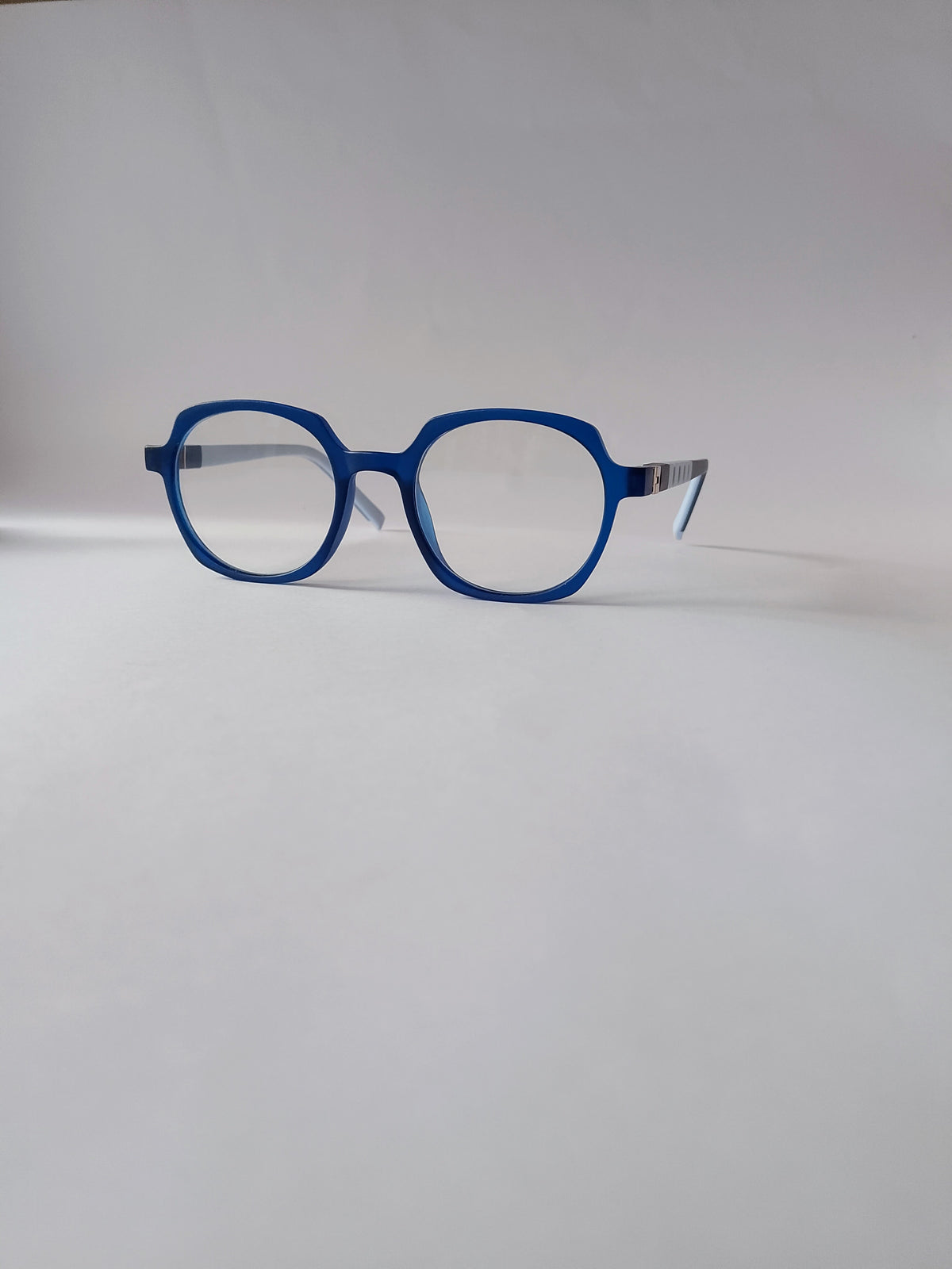 A blue geomatric kids frame, side view
