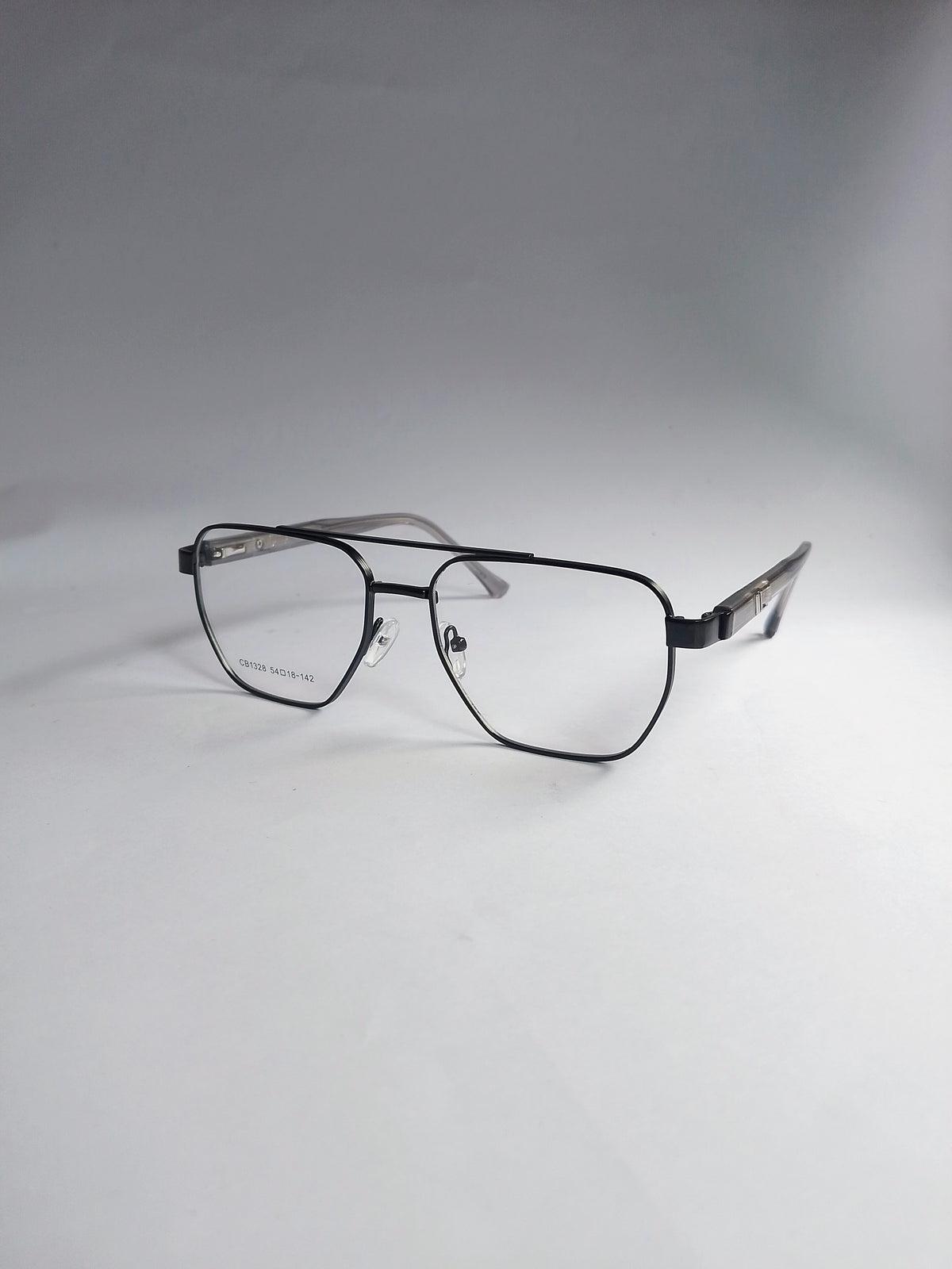 A pair of black metal eyeglasses with a double-bridge design and clear lenses, displayed on a light gray background.