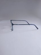 A pair of square-frame eyeglasses with a translucent blue acetate frame and clear lenses, temple arm view, displayed  on a studio light gray background