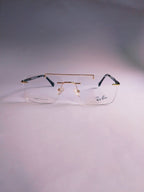 Rexon golden rimless rectangular eyeglasses front view