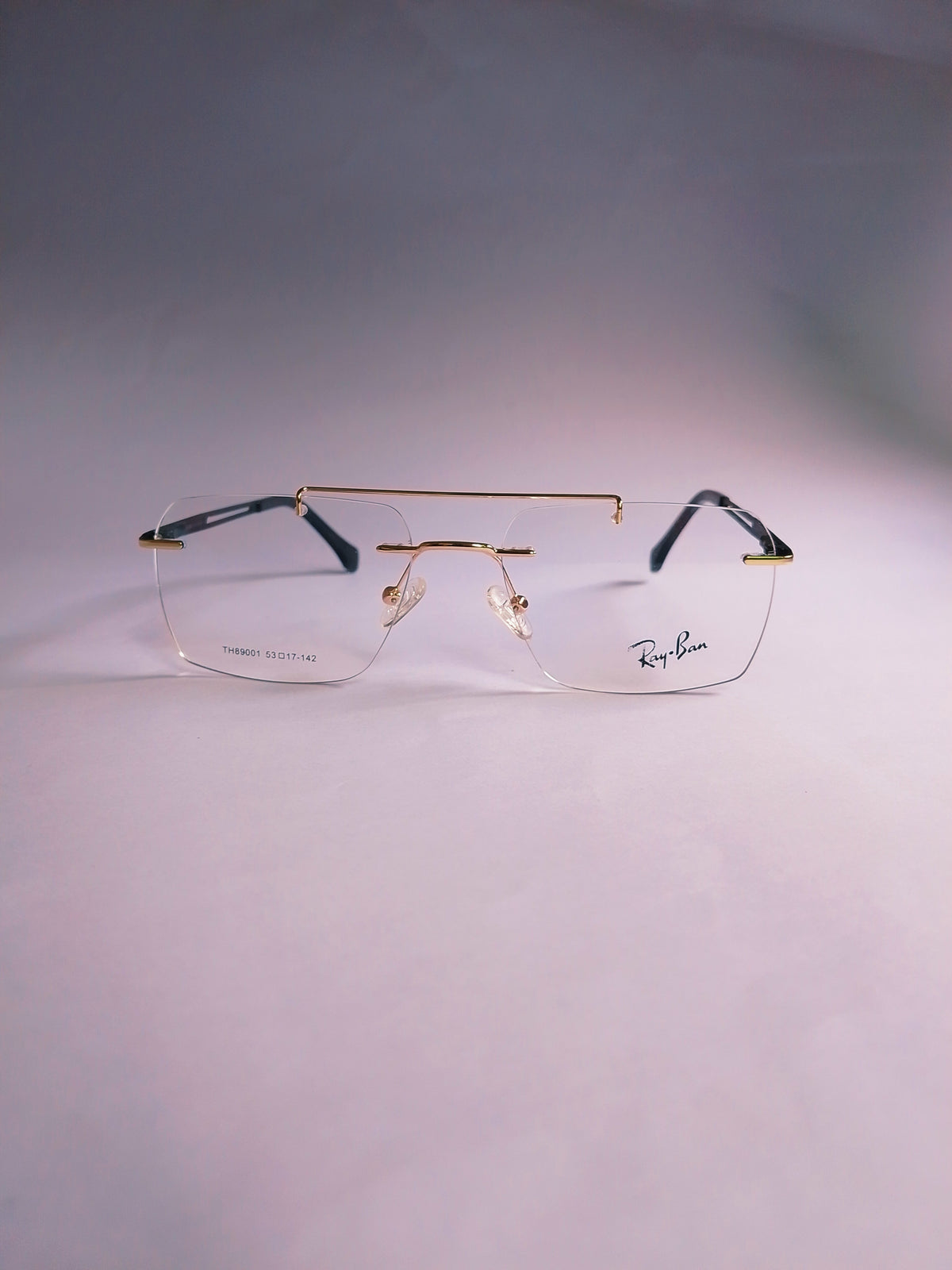 Rexon golden rimless rectangular eyeglasses front view