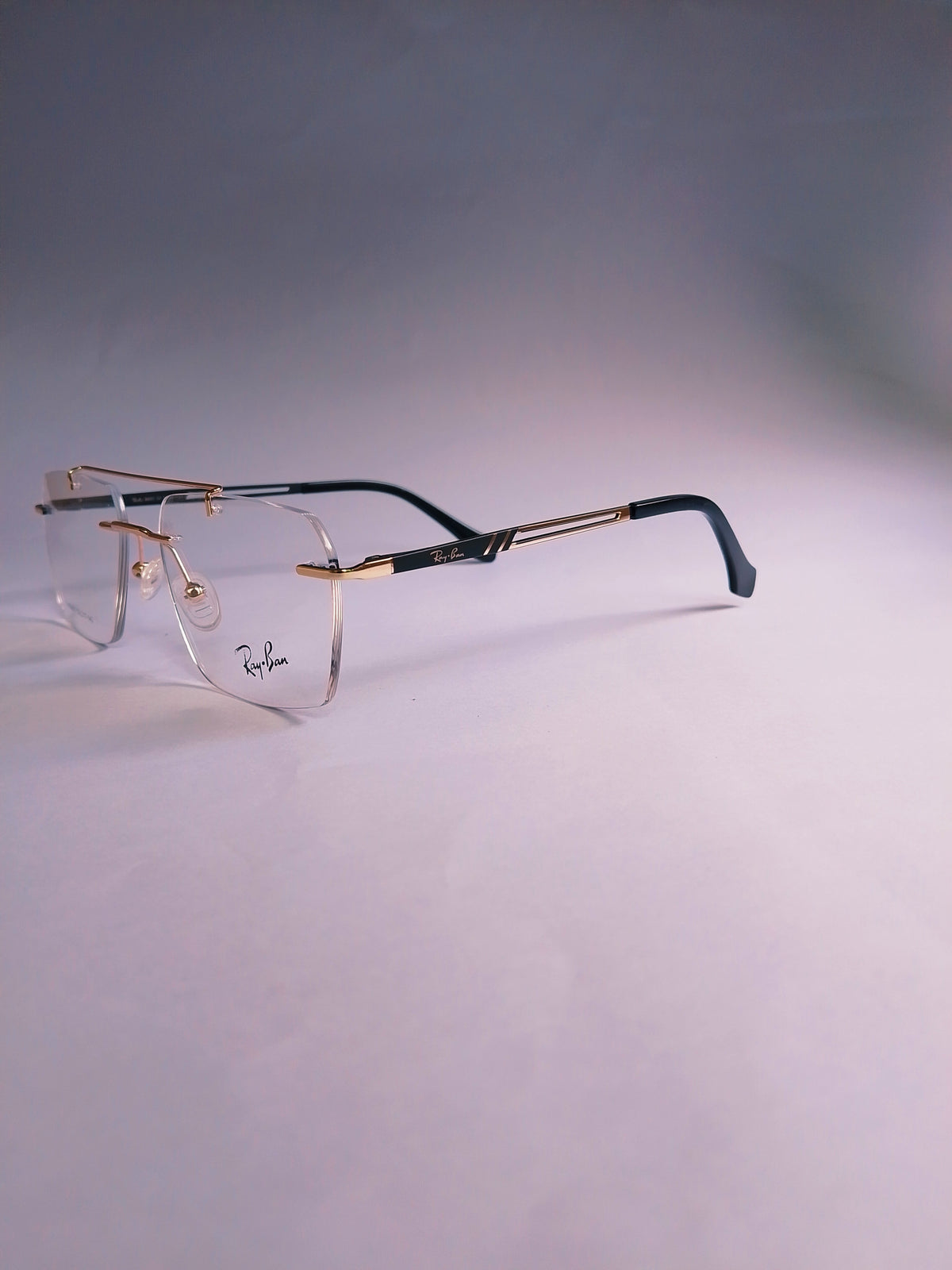 Rexon golden frame side view showing black temple tips