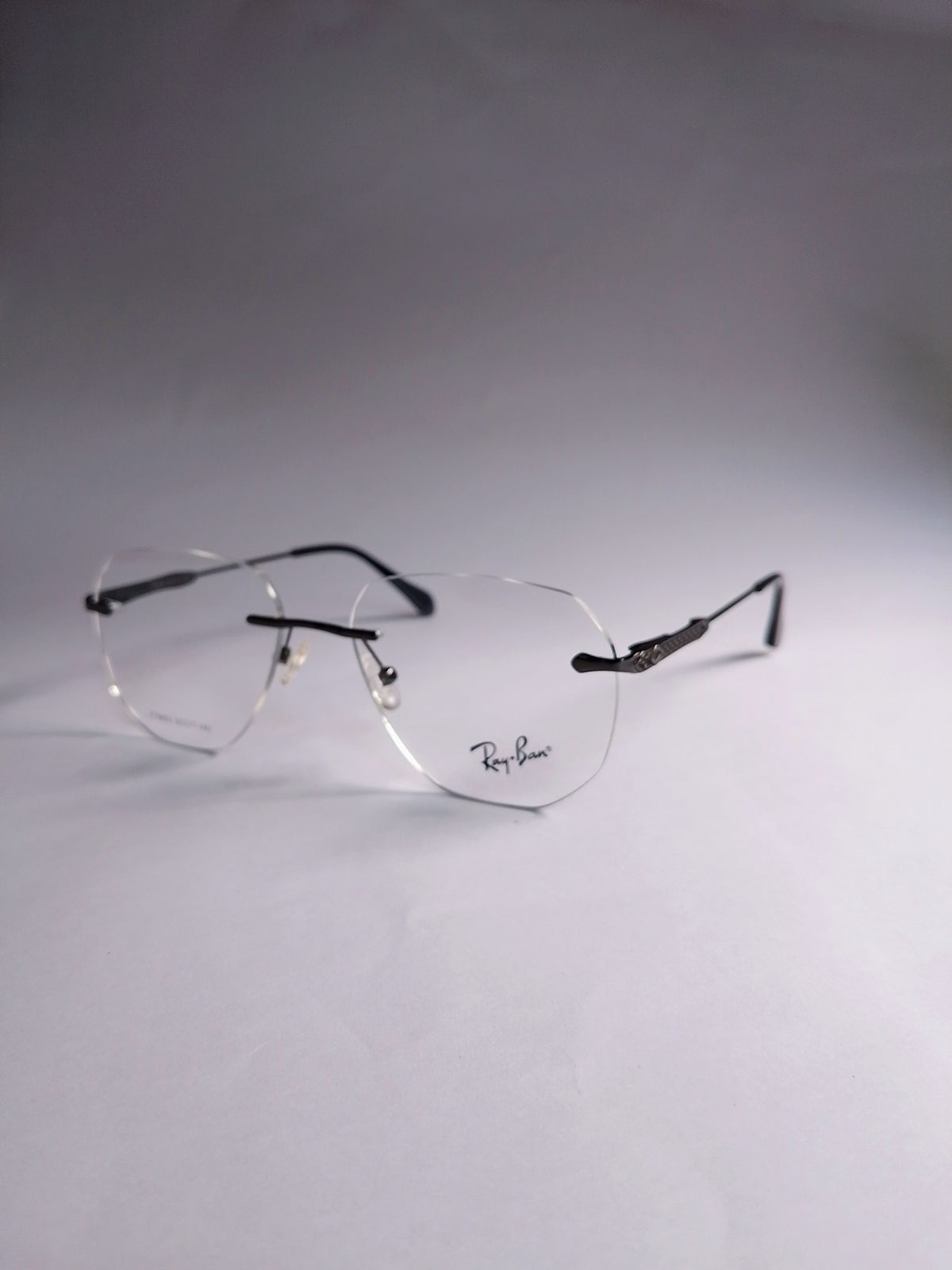 Zayn premium quality rimless eyeglasses front view with soft geometric lenses
