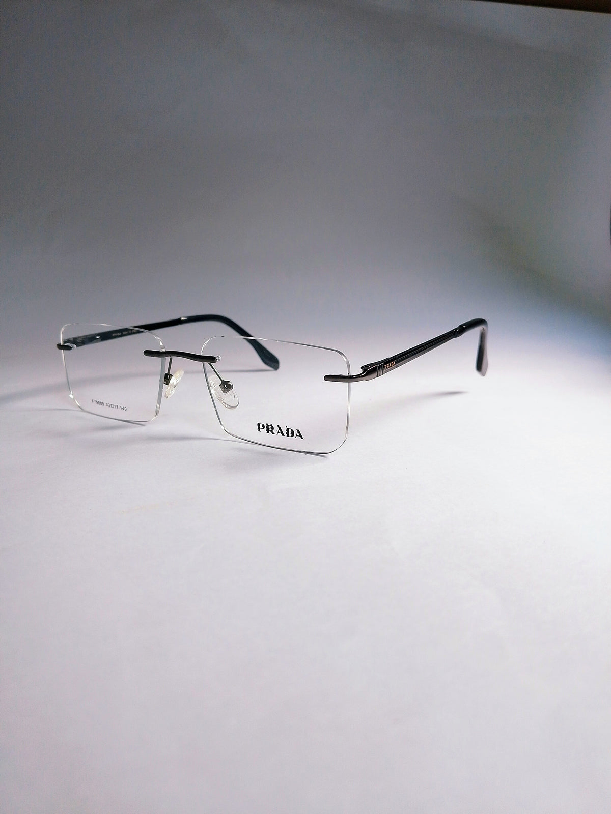 Liora rimless stylish frame three-quarter view with dark temples