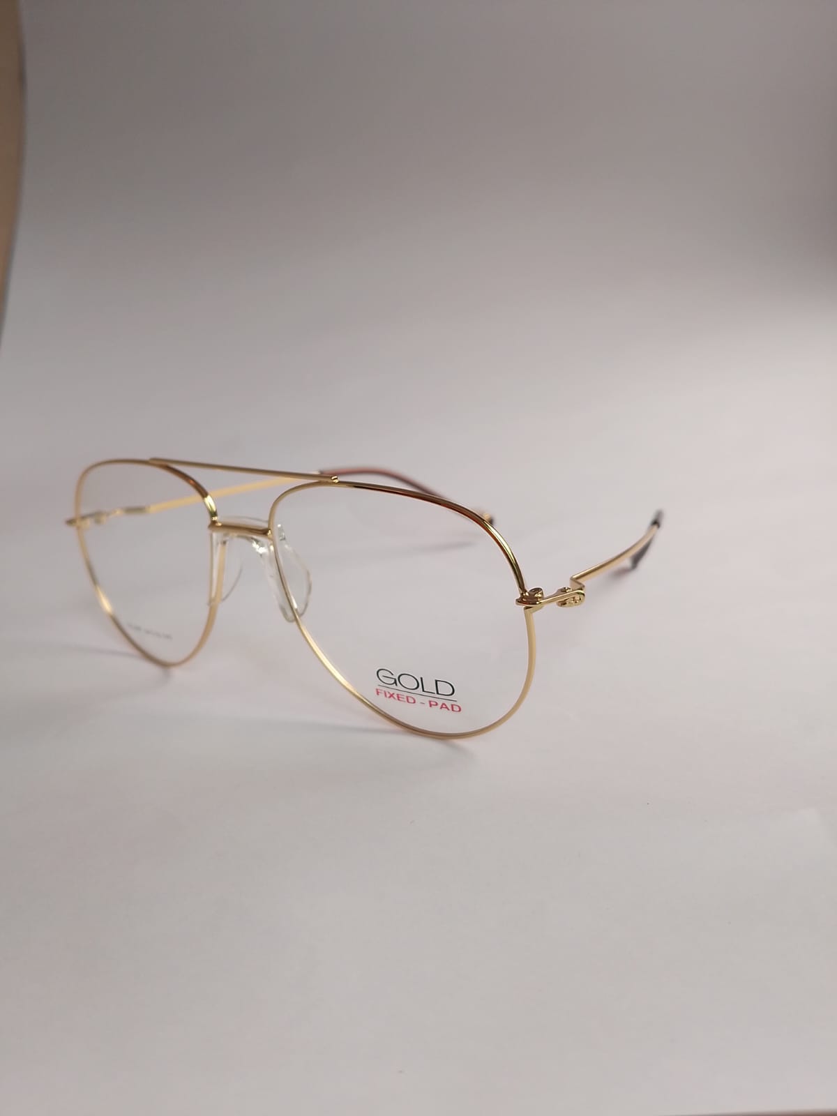 Gold Aviator metal eyeglasses with fixed nose pad