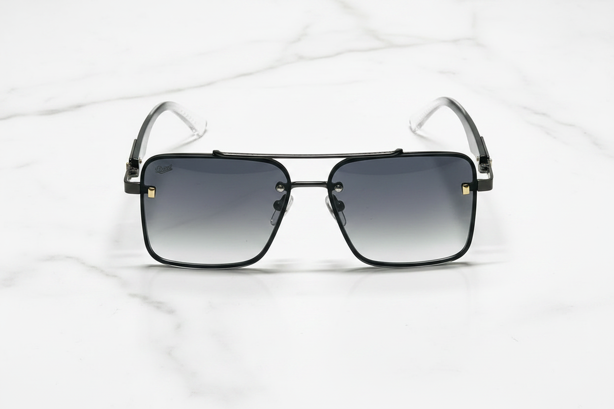 Stylish black aviator sunglasses with gradient lenses on marble surface