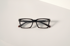 Black rectangular stylish frames with clear lenses  and premium quality on white surface