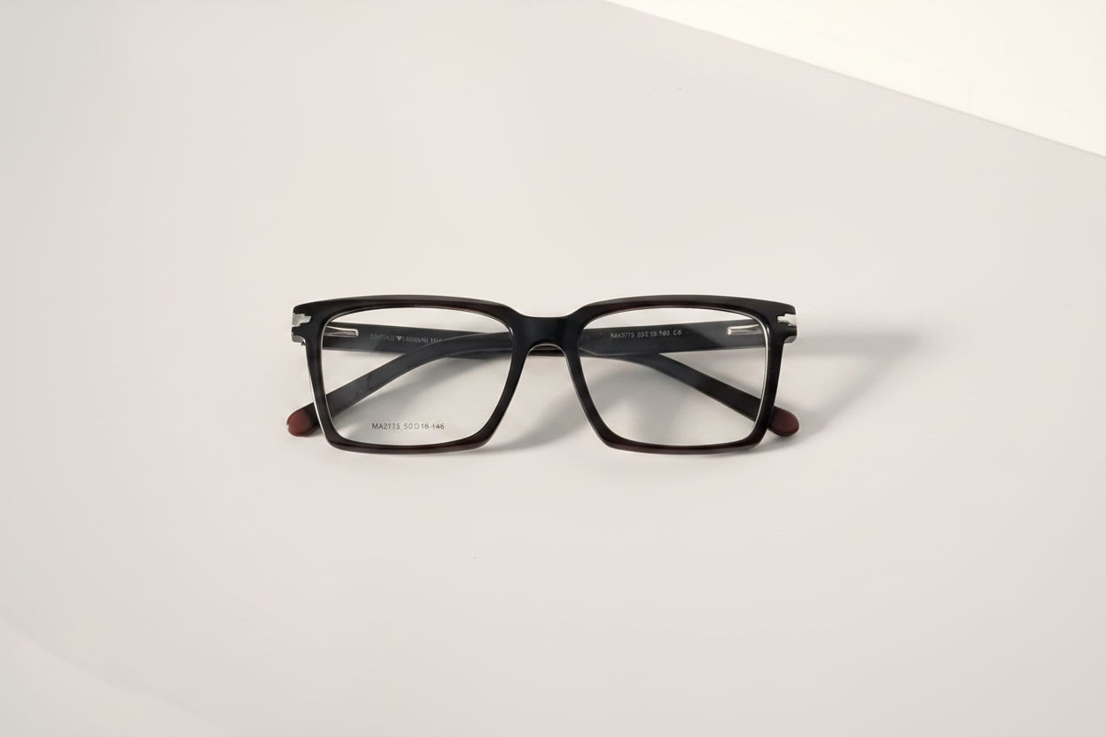 Black rectangular stylish frames with clear lenses  and premium quality on white surface