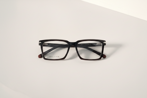 Black rectangular stylish frames with clear lenses  and premium quality on white surface