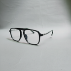 Black square eyeglasses with clear lenses, displayed on a light gray background.