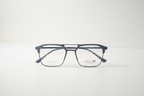 Modern gray geometric eyeglass frames with clear lenses, stylish unisex design for everyday wear